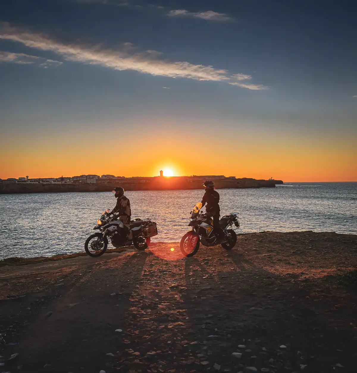 Motorcycle couple Portugal sunset