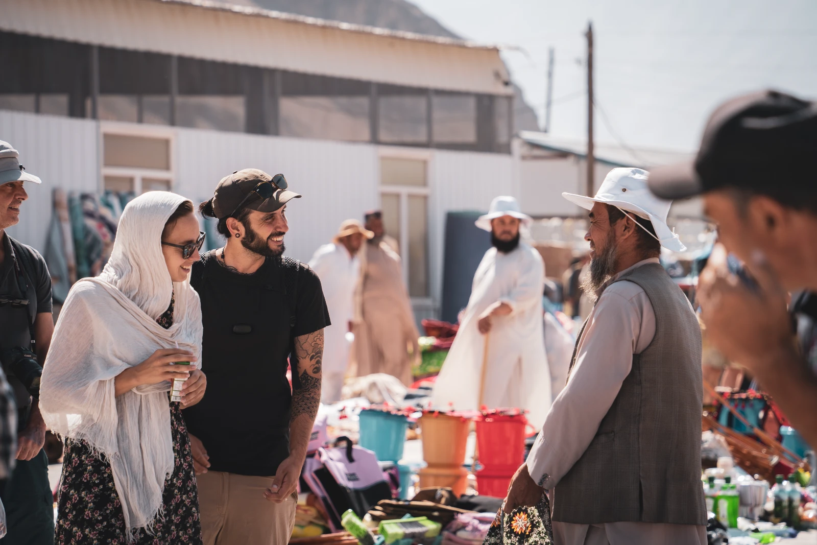Vins and Natha at the Afghan market on the Pamir Highway