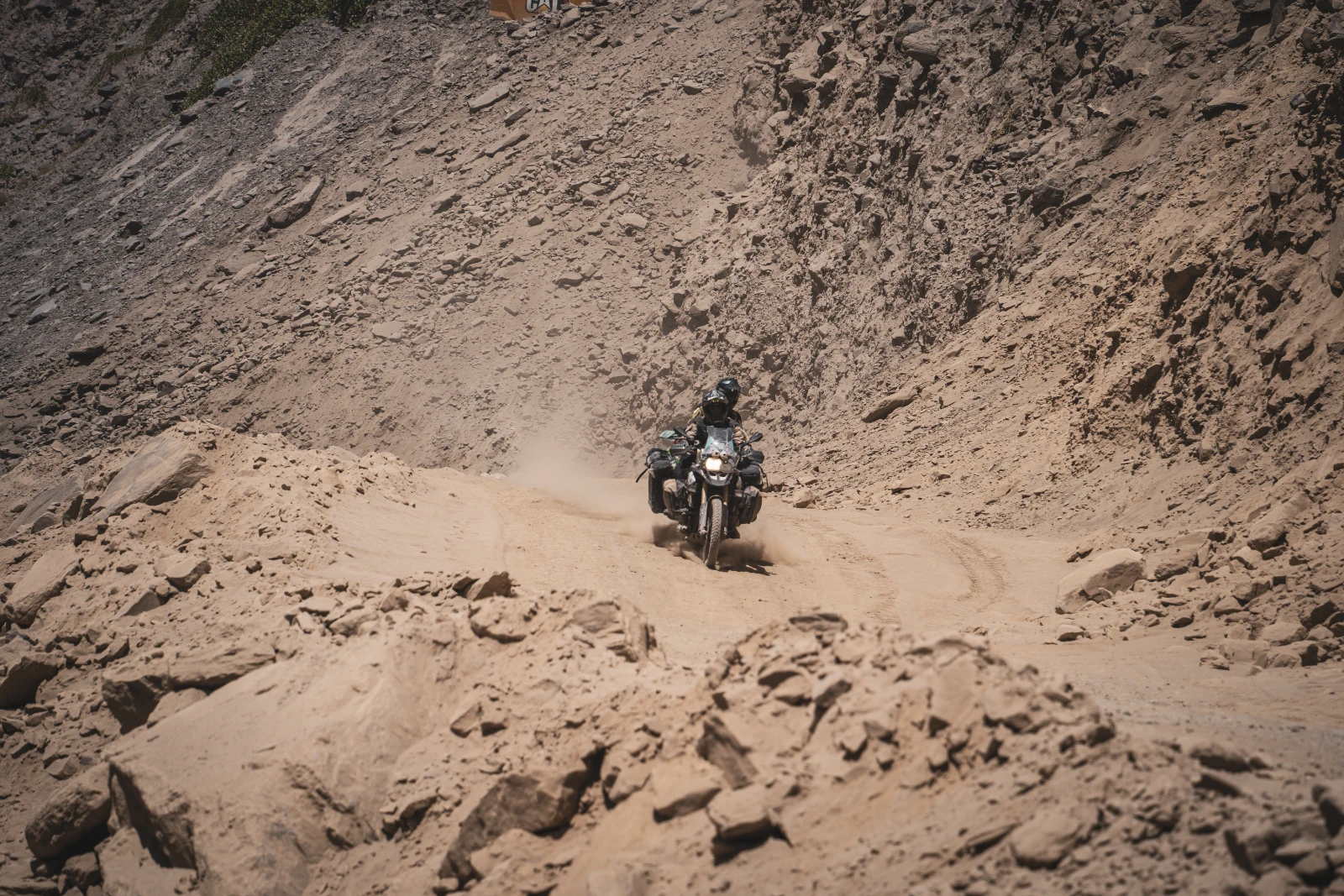 The dust of the Pamir Highway construction zone