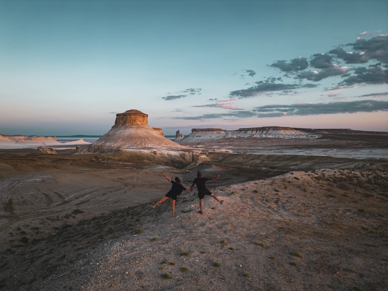 Mangystau couple motorcycle landscape