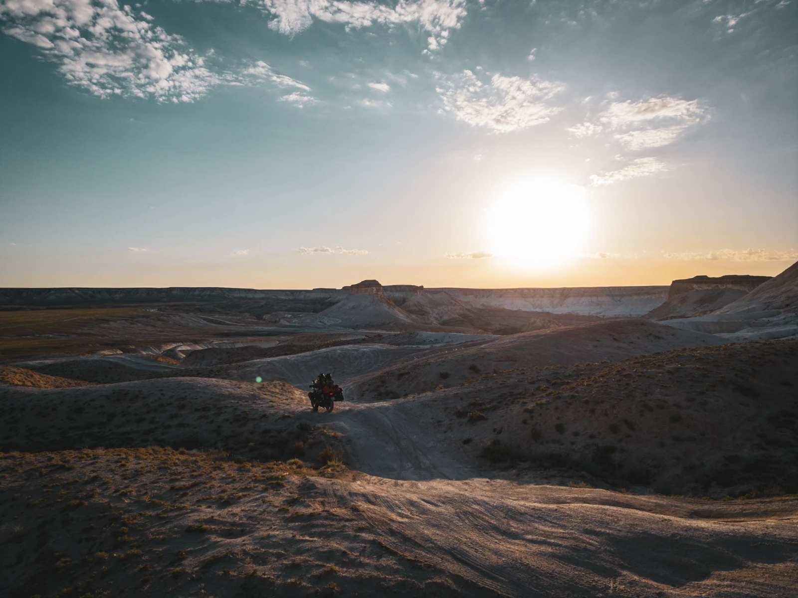 Sunrise road through the Mangystau desert pistes