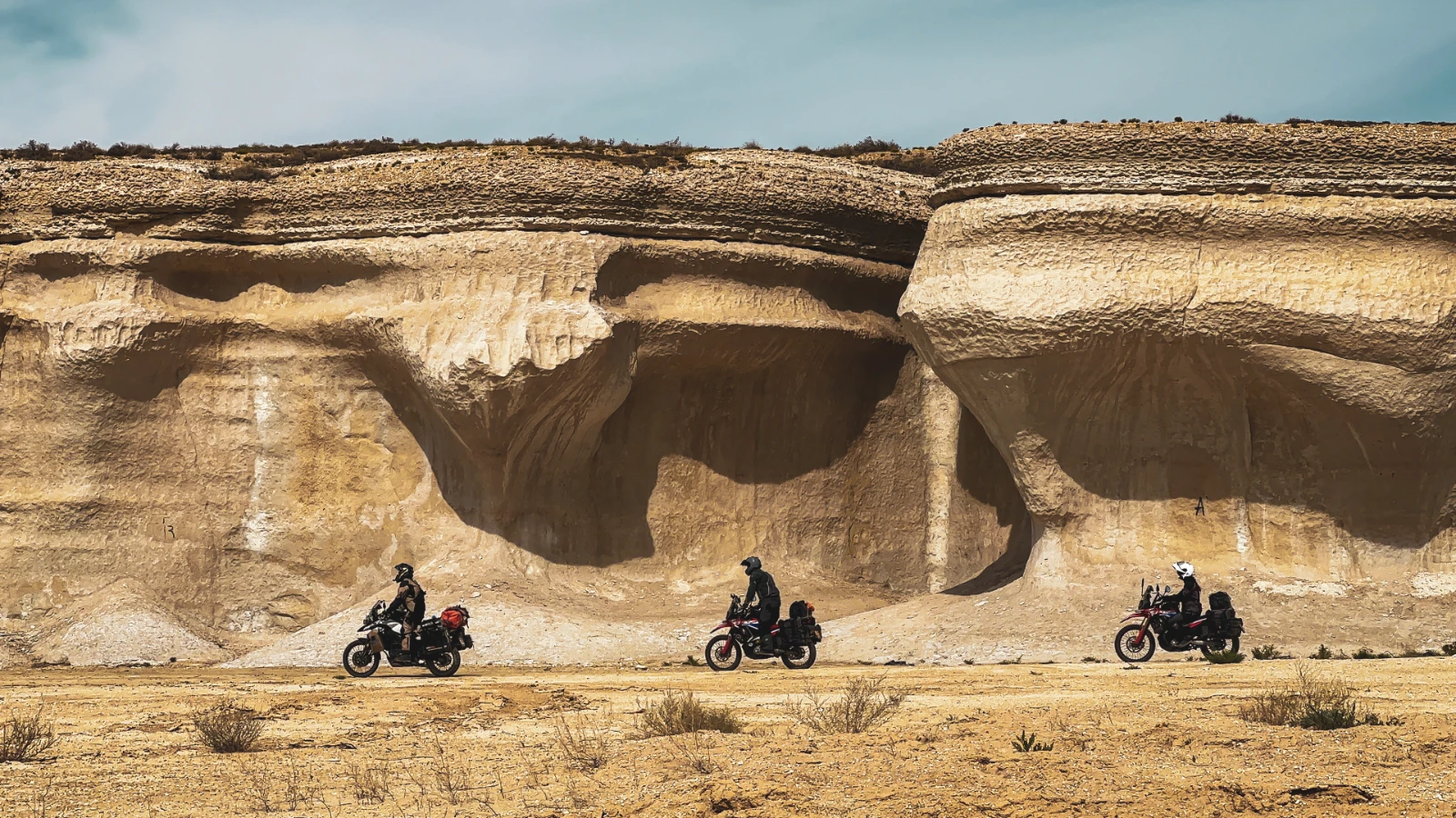 Riding through the Mangystau desert pistes — four riders