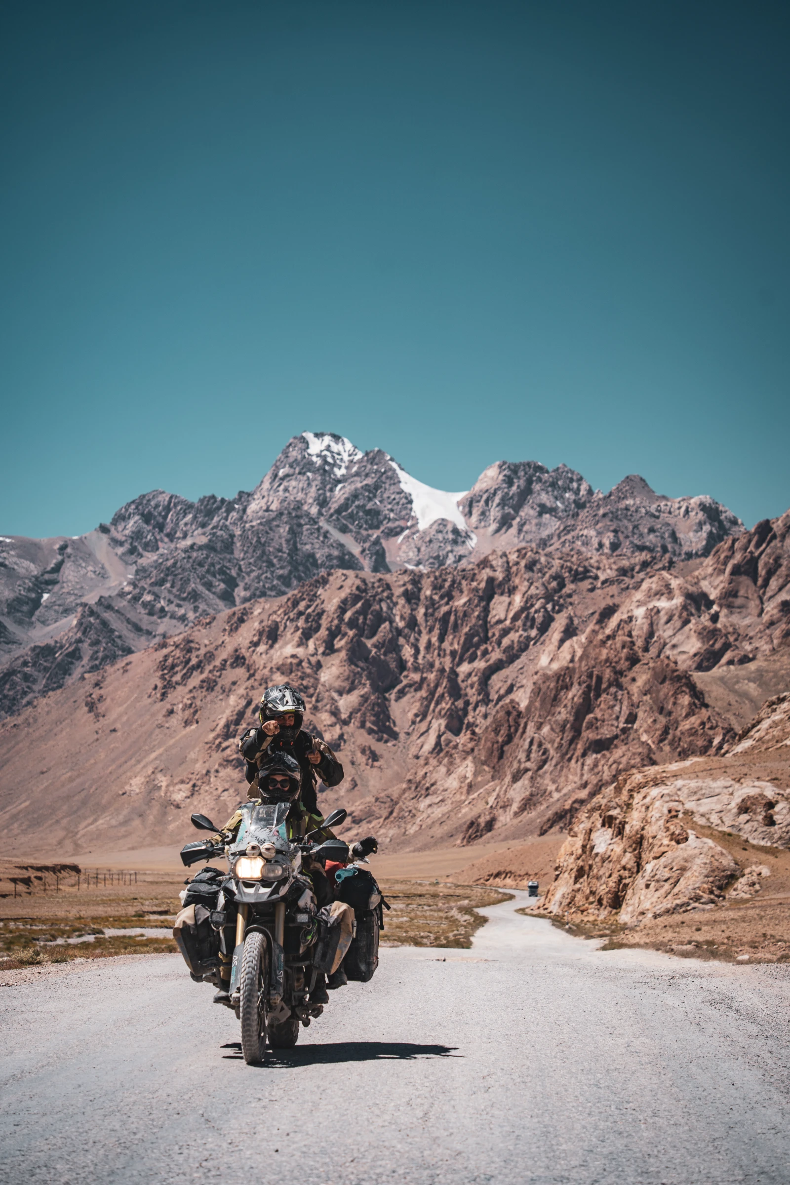 Natha riding Falkor on the Pamir Highway