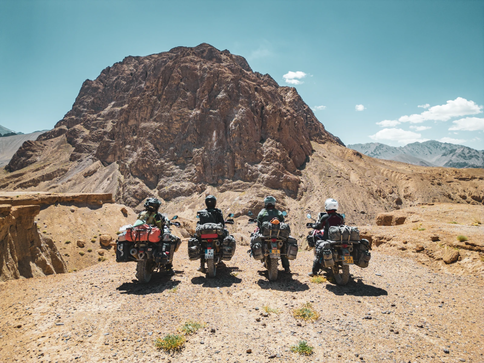 Drone view from behind, our five motorcycle crew on the Pamir plateau