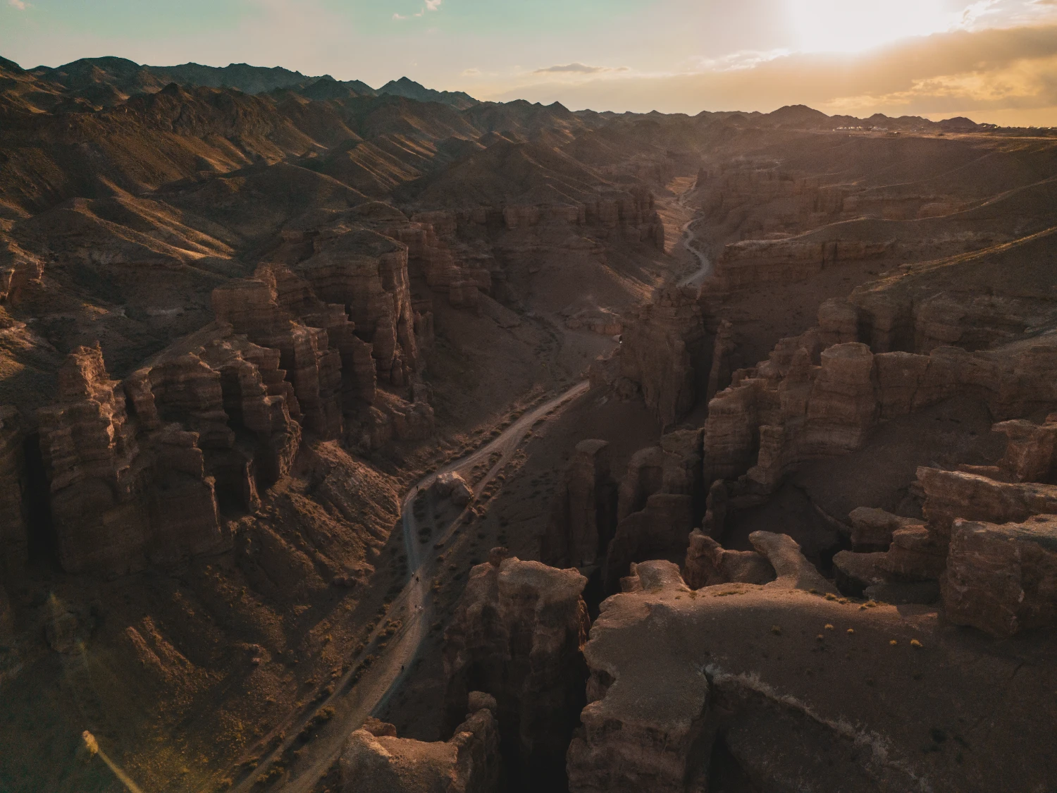 Charyn Canyon Kazakhstan sunset anniversary motorcycle travel