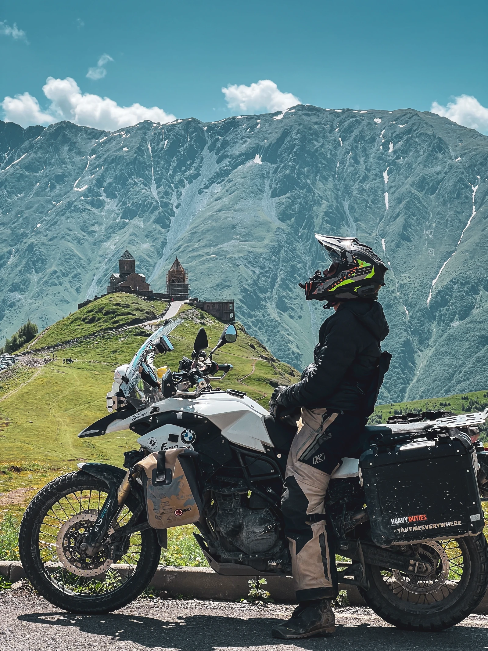 Motorcycles parked in Kazbegi, Georgia's last mountain village before Russia