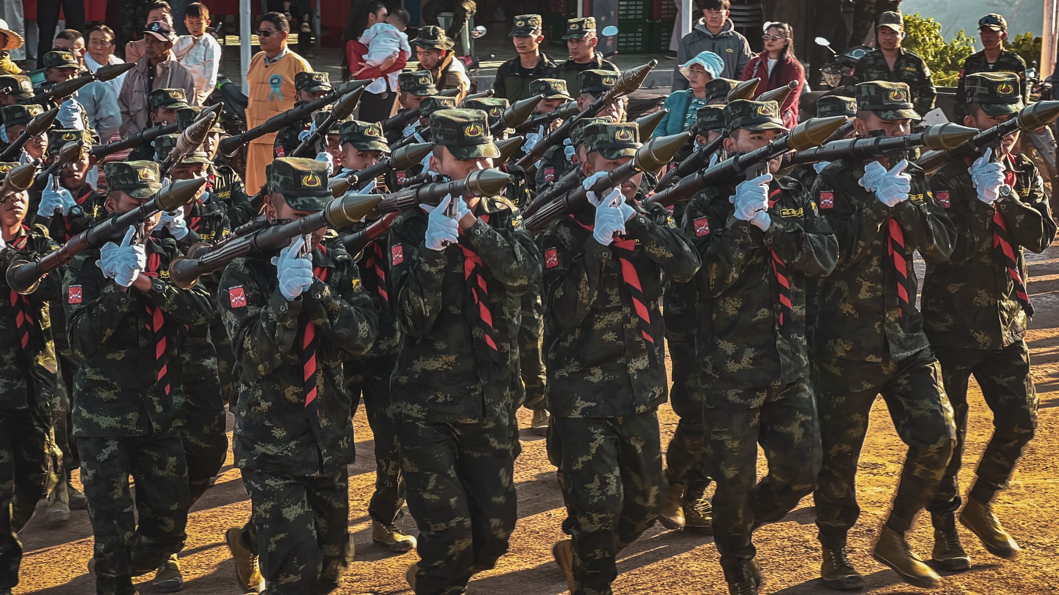 motorcycle travel Myanmar Shan State national day army parade